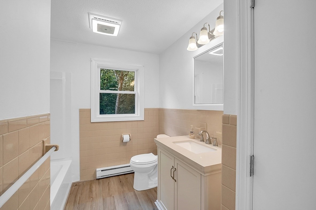 918 New Sherborn Road Athol, MA 01331 - Photo 15 of 41 a bathroom with a sink a toilet and a mirror