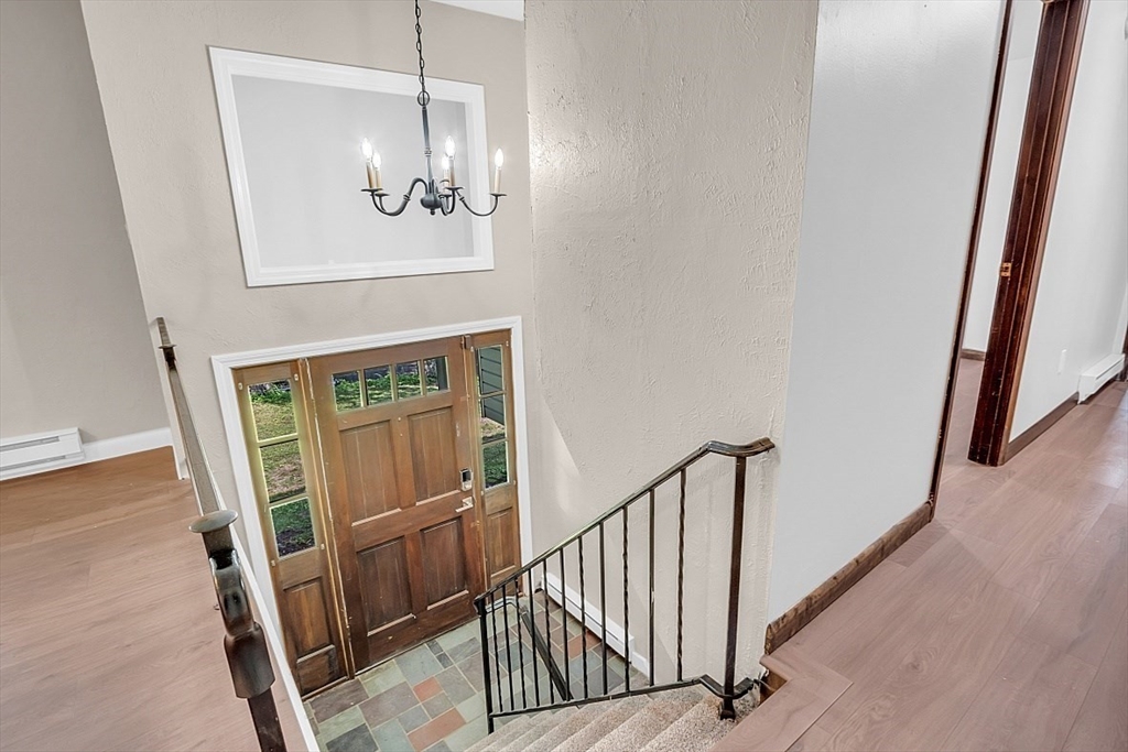918 New Sherborn Road Athol, MA 01331 - Photo 17 of 41 a view of a hallway with seating area