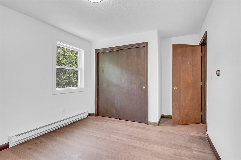 918 New Sherborn Road Athol, MA 01331 - Photo 18 of 41 an empty room with windows and closet