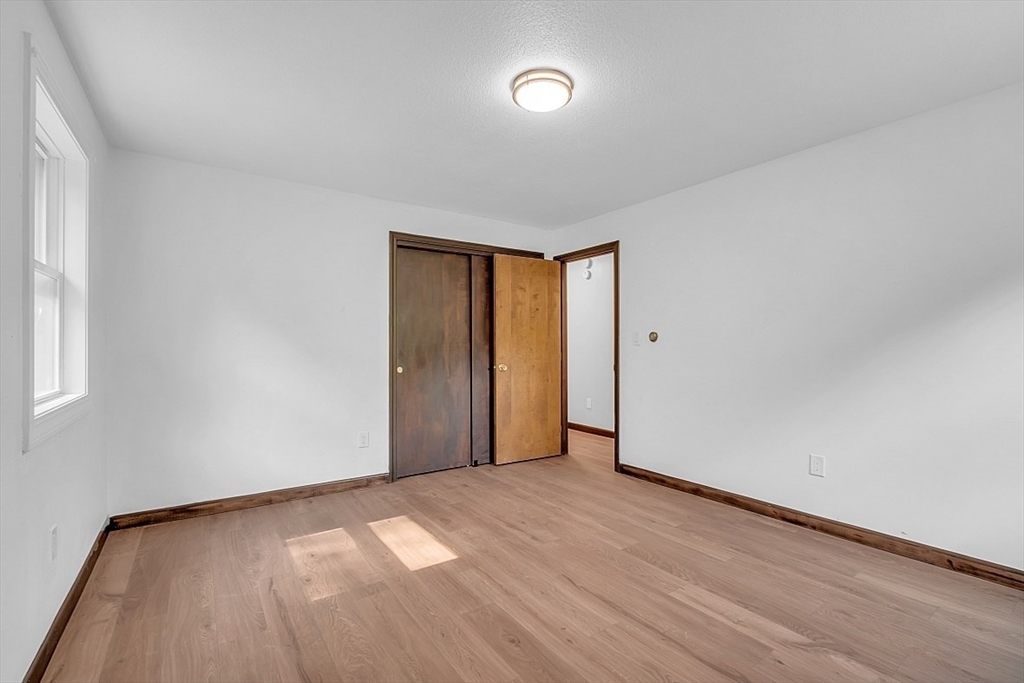 918 New Sherborn Road Athol, MA 01331 - Photo 20 of 41 a view of an empty room and window