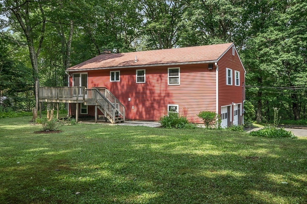 918 New Sherborn Road Athol, MA 01331 - Photo 2 of 41 a aerial view of a house next to a big yard and large trees