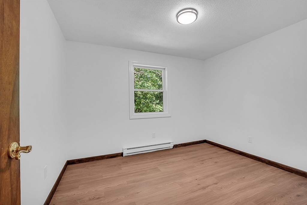 918 New Sherborn Road Athol, MA 01331 - Photo 24 of 41 an empty room with a window