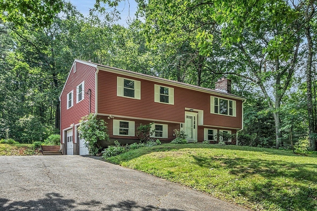 918 New Sherborn Road Athol, MA 01331 - Photo 36 of 41 a front view of a house with a yard
