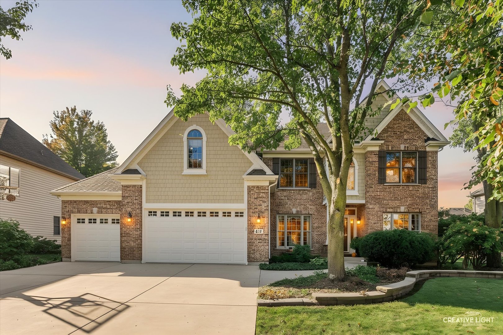 611 Pine Street Sugar Grove, IL 60554 - Photo 1 of 61 a front view of a house with a yard