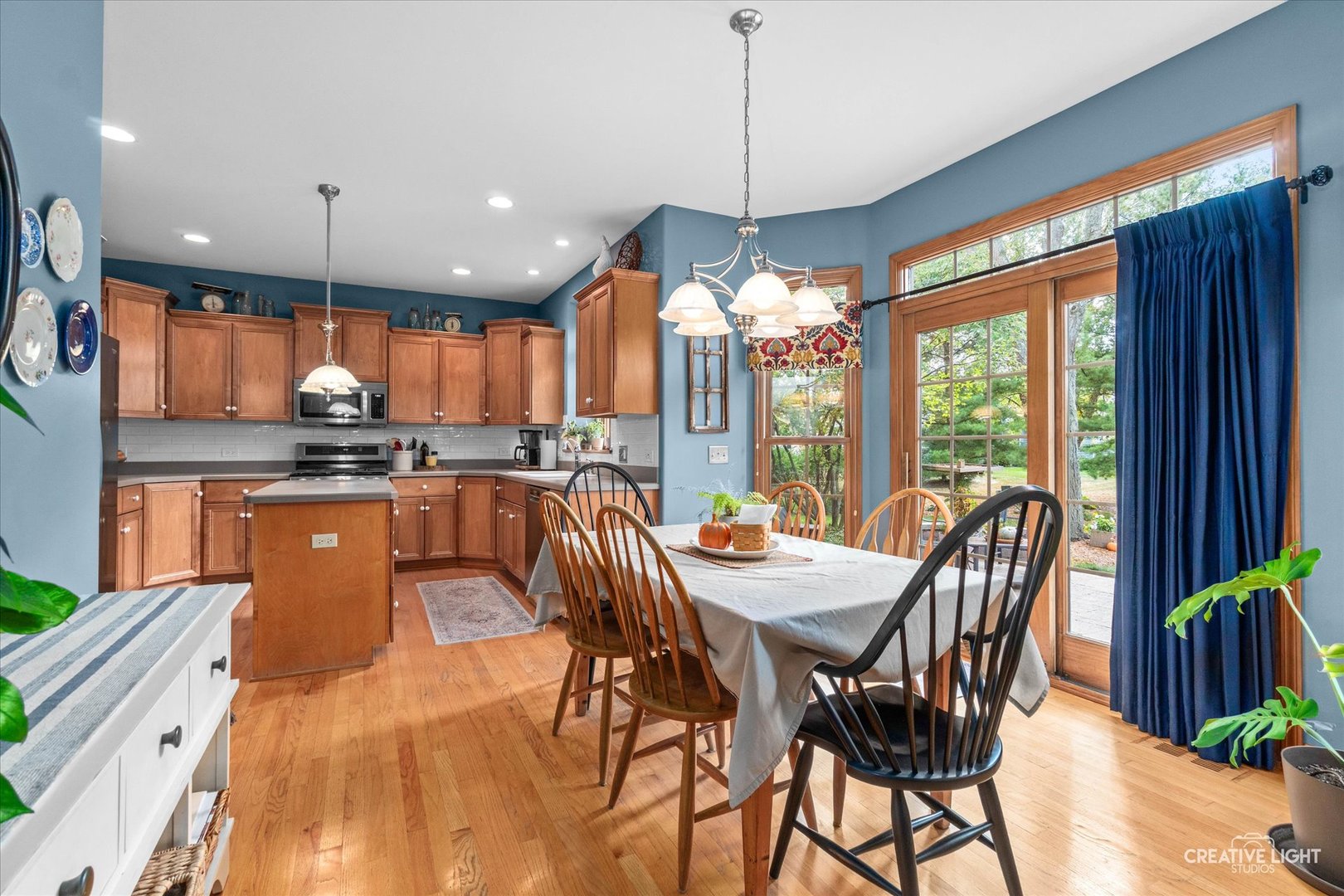 611 Pine Street Sugar Grove, IL 60554 - Photo 12 of 61 a view of a dining room with furniture window and outside view