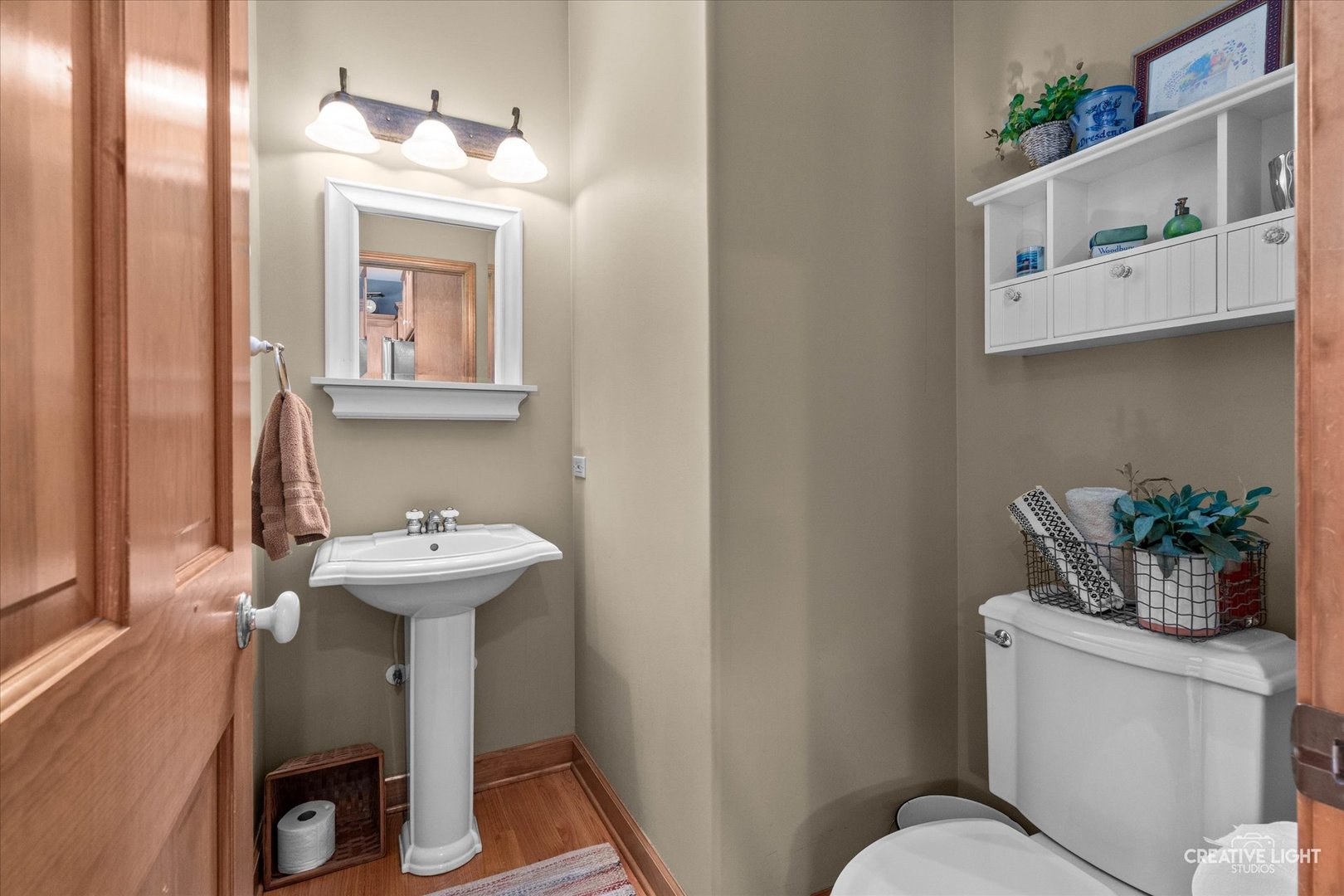 611 Pine Street Sugar Grove, IL 60554 - Photo 16 of 61 a bathroom with a toilet sink and mirror