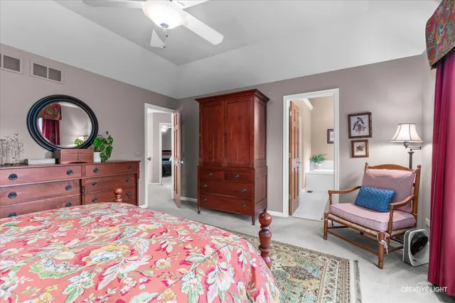 a view of a bathroom from a hallway