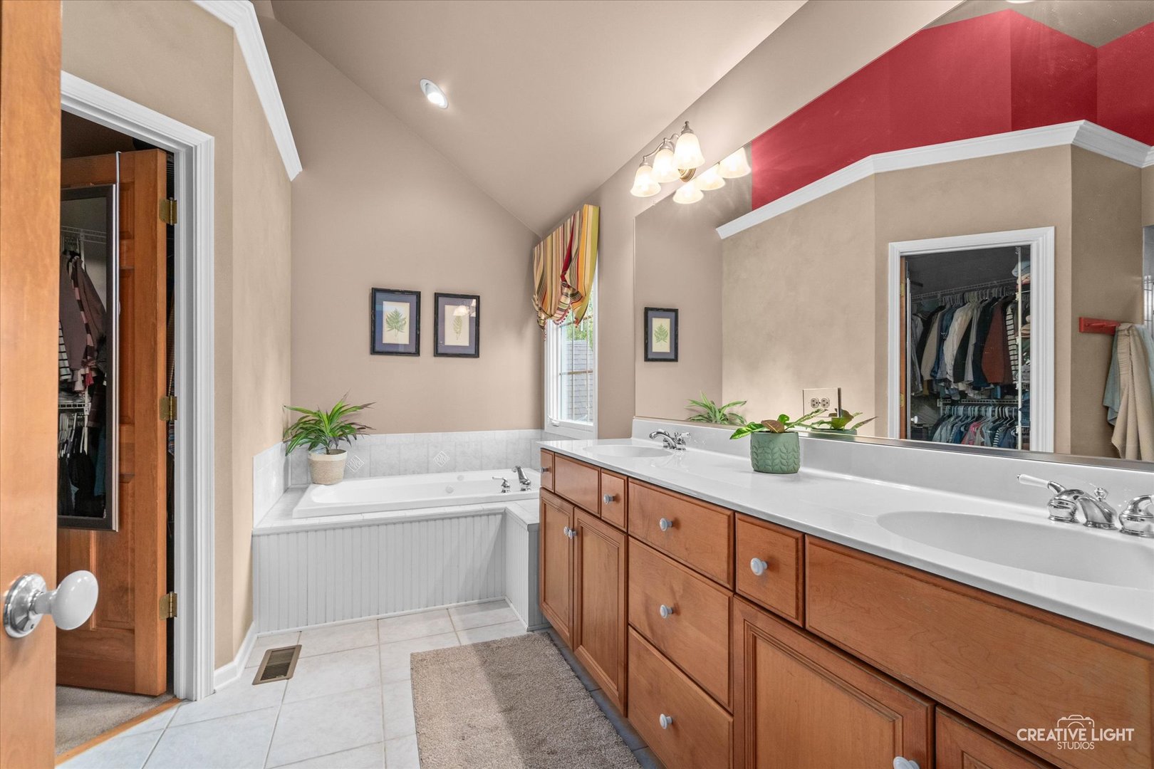 611 Pine Street Sugar Grove, IL 60554 - Photo 24 of 61 a spacious bathroom with a granite countertop sink mirror and a bathtub