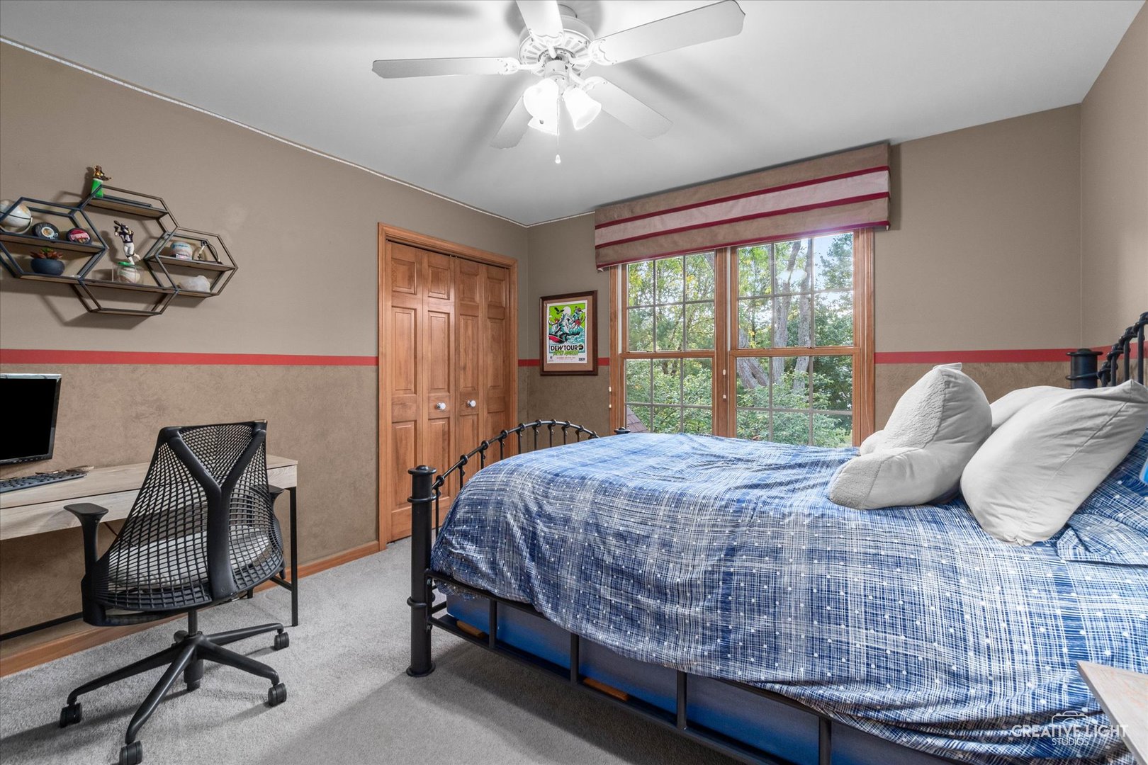 611 Pine Street Sugar Grove, IL 60554 - Photo 27 of 61 a bedroom with a bed and a chandelier