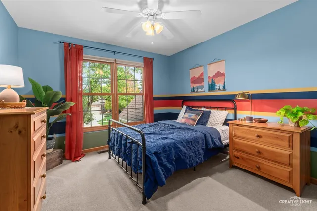 a room that has a rug and a chair in it