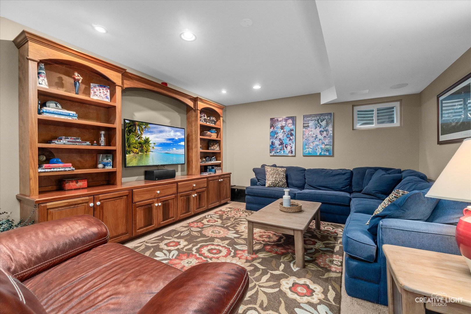 611 Pine Street Sugar Grove, IL 60554 - Photo 34 of 61 a living room with furniture a flat screen tv and kitchen view