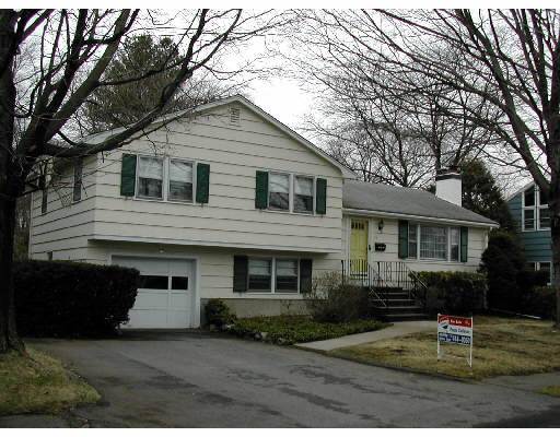 19 Ina Road Needham, MA 02492 - Photo 1 of 1 a front view of a house with a yard