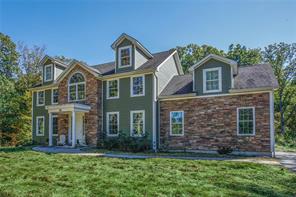 front view of house with a yard