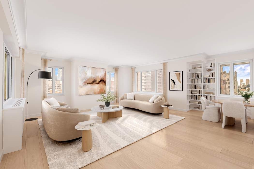 140 East 72nd Street, Unit PH Manhattan, NY 10021 - Photo 2 of 12 a living room with furniture and a couch