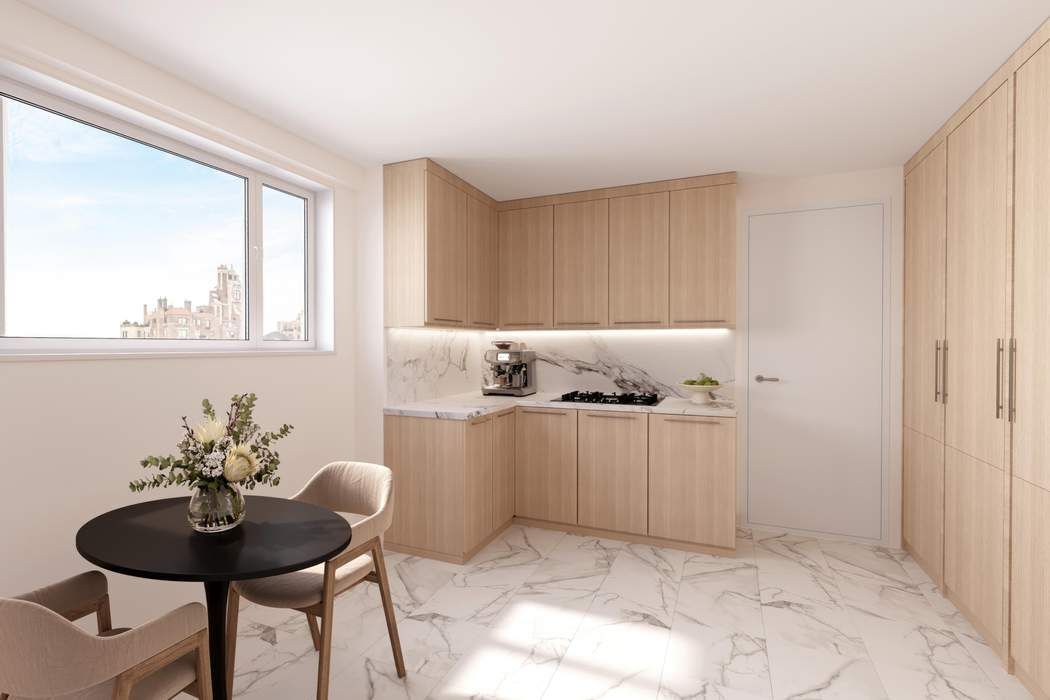 140 East 72nd Street, Unit PH Manhattan, NY 10021 - Photo 3 of 12 a kitchen with a table and chairs in it