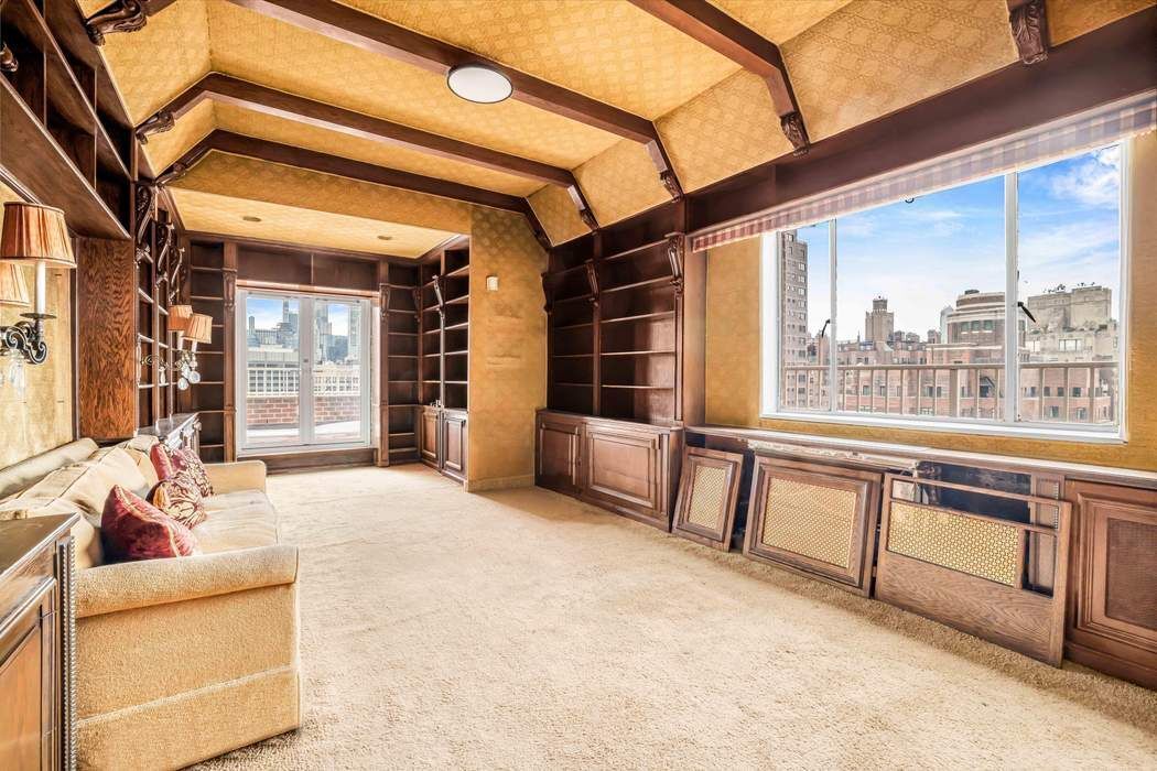 140 East 72nd Street, Unit PH Manhattan, NY 10021 - Photo 9 of 12 a view of a building with a large window