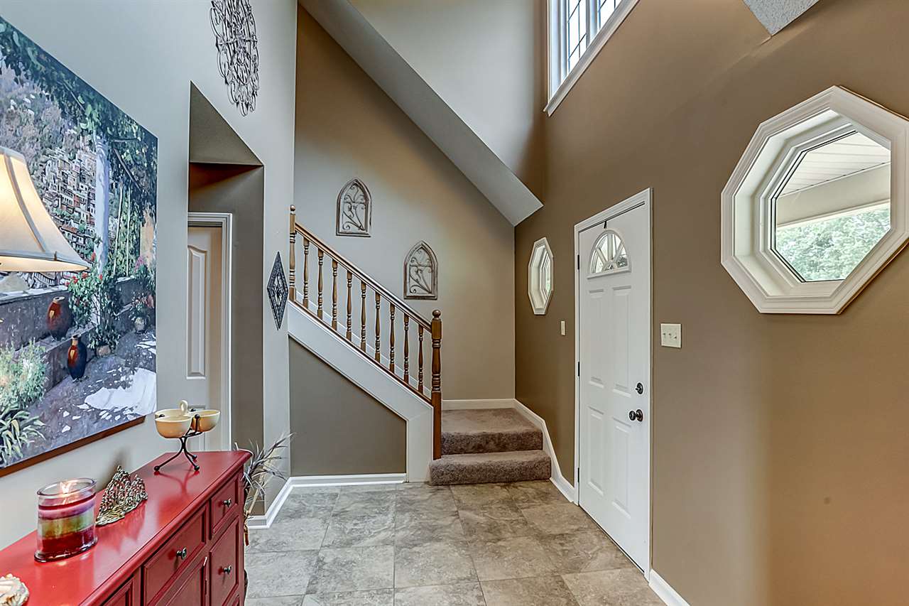 9465 Pleasant Ridge Road Lakeland, TN 38002 - Photo 4 of 18 Gorgeous 2 story foyer with ceramic tile, transom windows and tons of lighting.