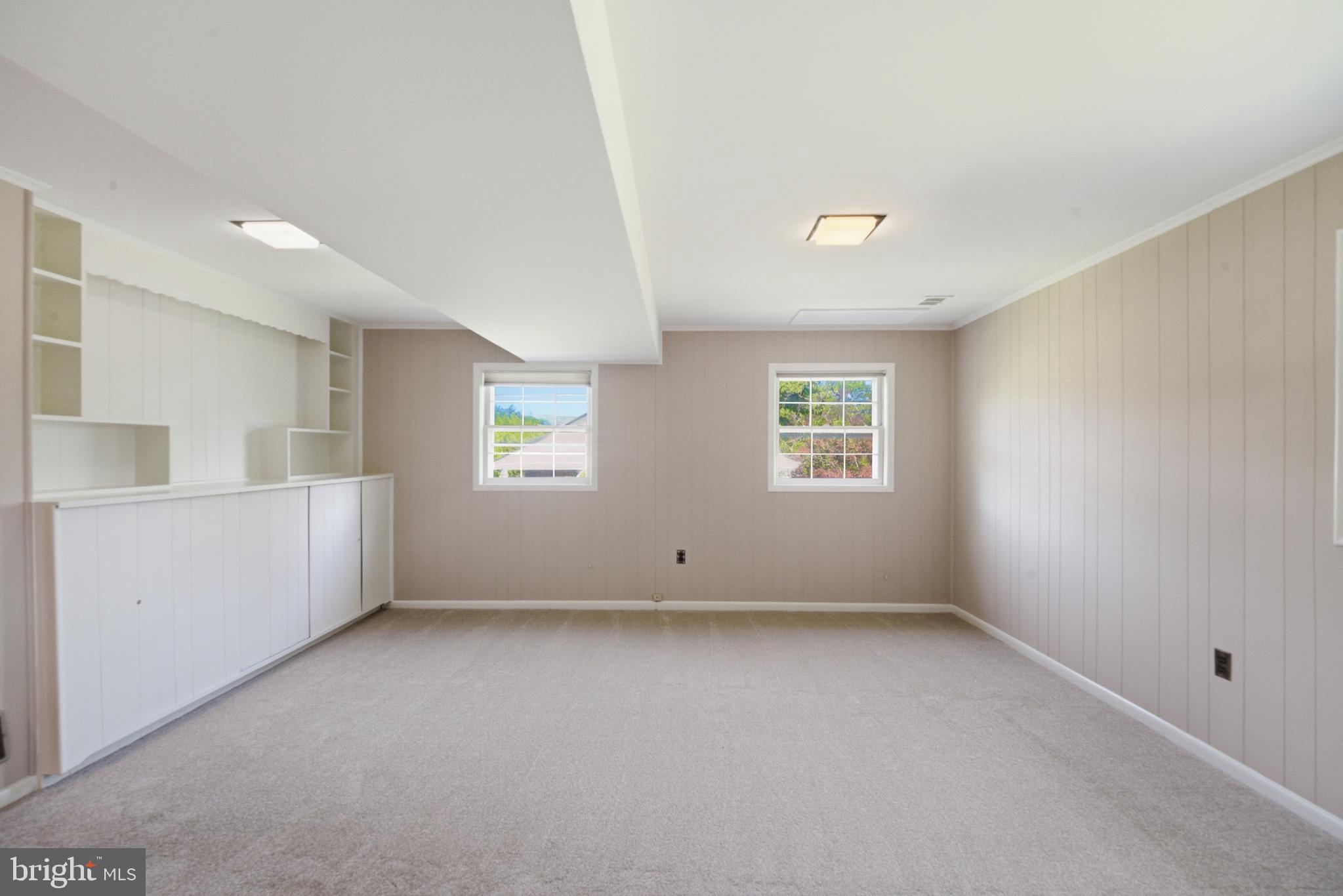 13309 Old Forge Road Silver Spring, MD 20904 - Photo 24 of 52 an empty room with windows