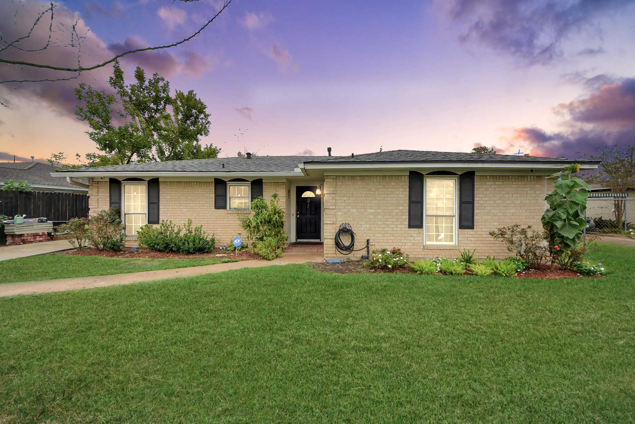 2443 Lauder Road Houston, TX 77039 - Photo 1 of 21 a front view of house with a garden