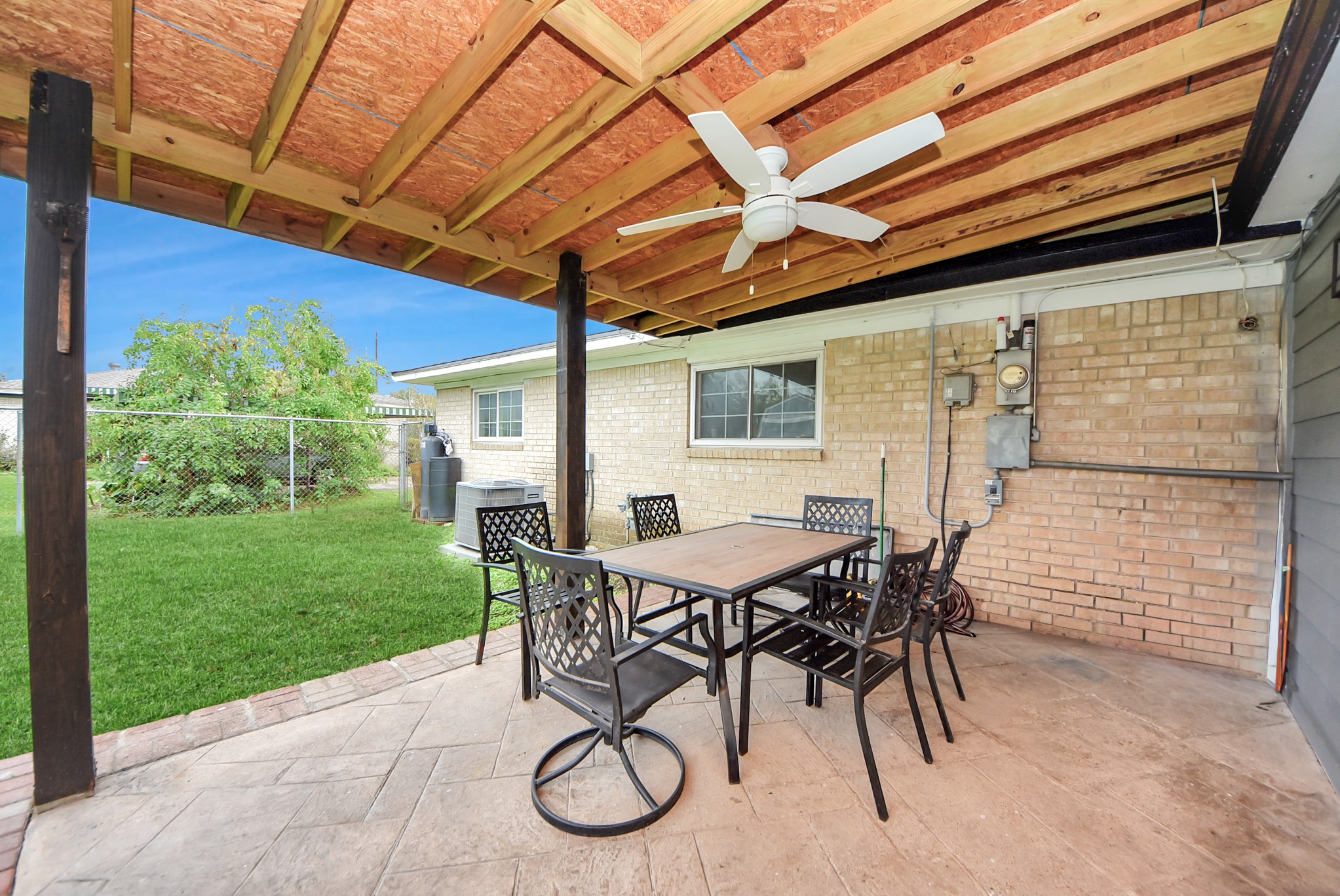 2443 Lauder Road Houston, TX 77039 - Photo 18 of 21 a view of a patio with table and chairs and potted plants