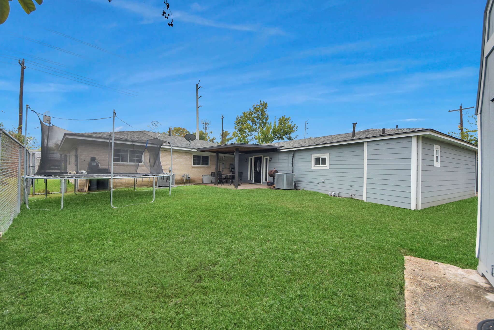 2443 Lauder Road Houston, TX 77039 - Photo 19 of 21 a view of a house with a backyard
