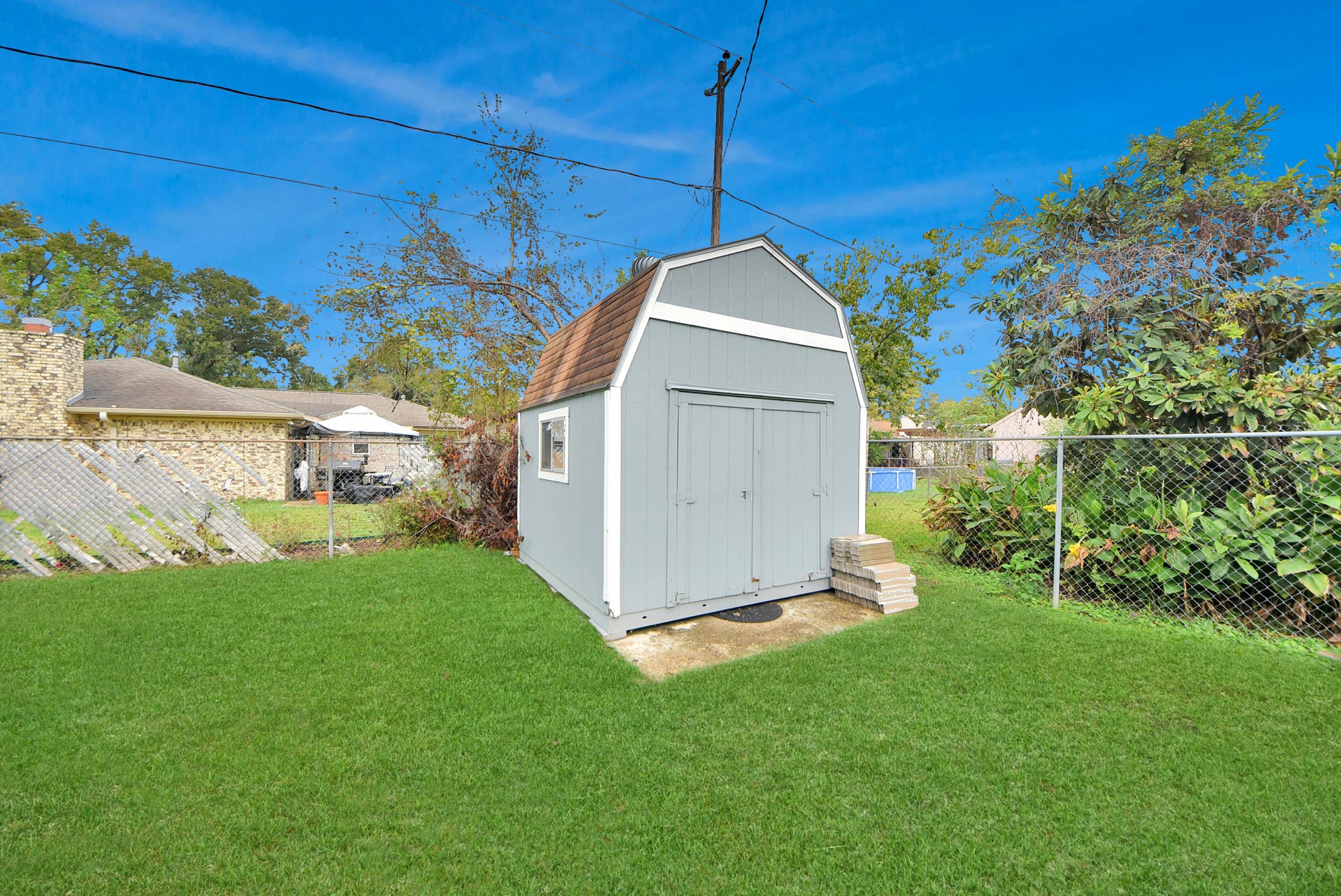 2443 Lauder Road Houston, TX 77039 - Photo 20 of 21 a view of a back yard of the house