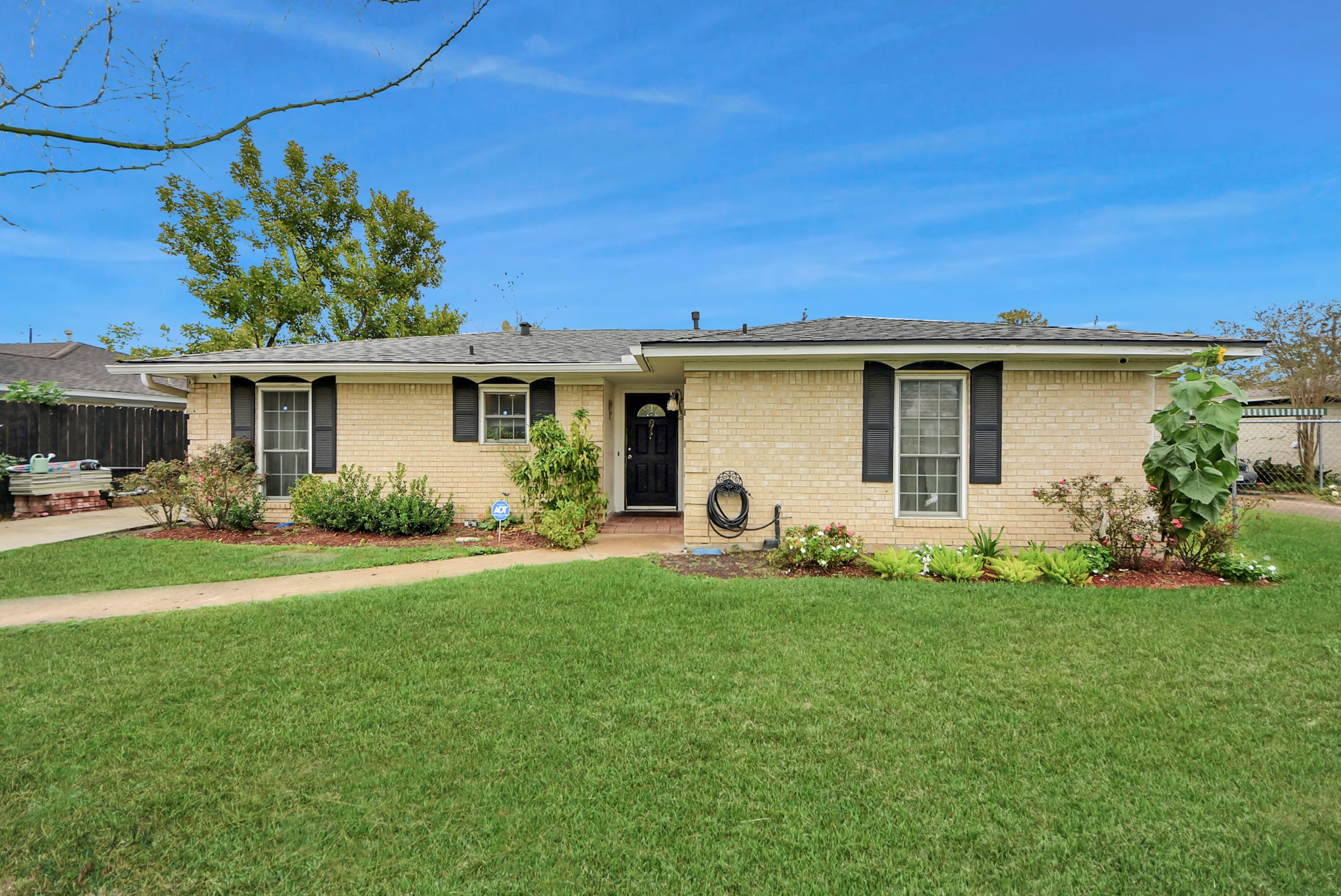 2443 Lauder Road Houston, TX 77039 - Photo 2 of 21 a front view of house with a garden