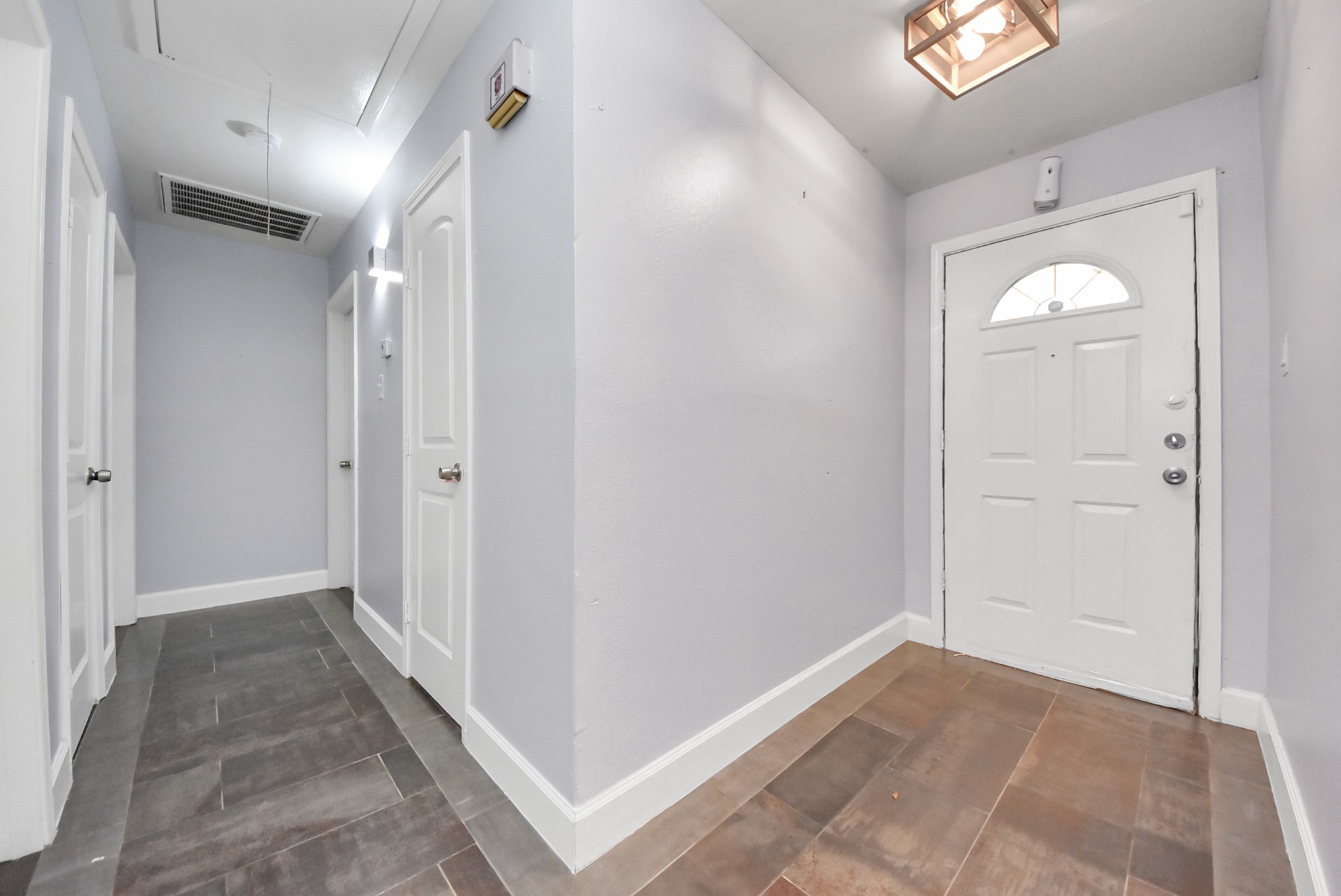 2443 Lauder Road Houston, TX 77039 - Photo 5 of 21 a view of a hallway with wooden floor