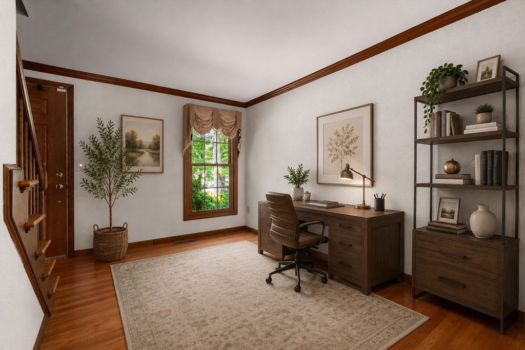 2035 Parker Street Springfield, MA 01128 - Photo 27 of 42 a view of a workspace with furniture and a window