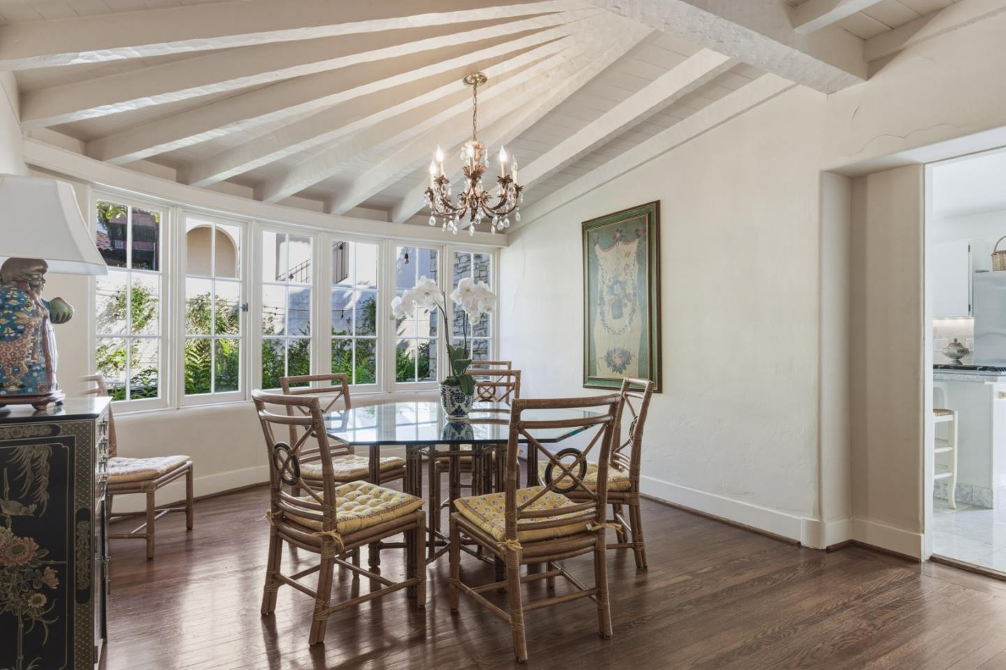 25286 Hatton Road Carmel, CA 93923 - Photo 15 of 34 a view of a dining room with furniture window and wooden floor