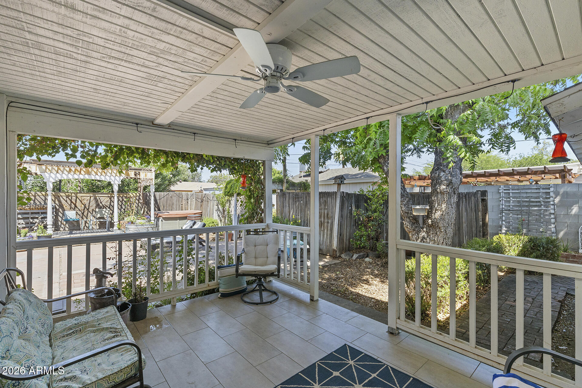 5228 North 15th Street Phoenix, AZ 85014 - Photo 61 of 96 a view of a patio with a table chairs and backyard