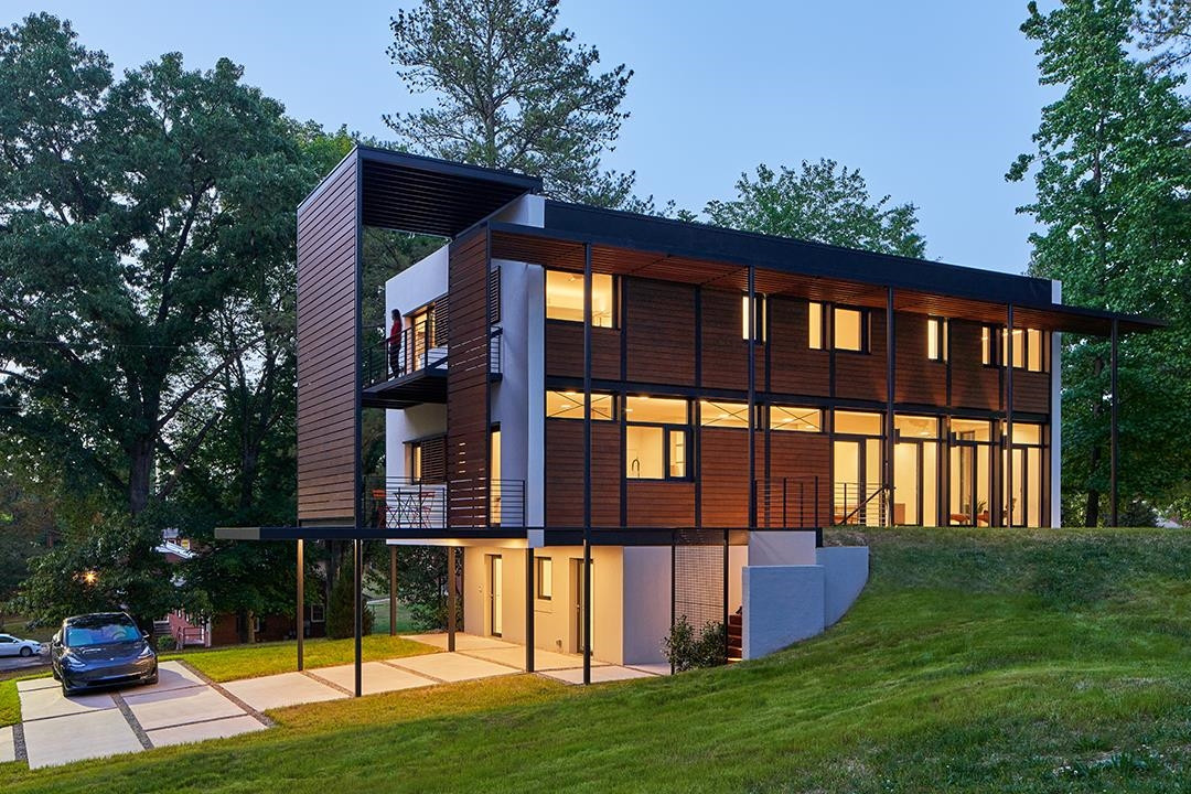 920 Tower Street Raleigh, NC 27607 - Photo 2 of 54 a view of a house with a yard