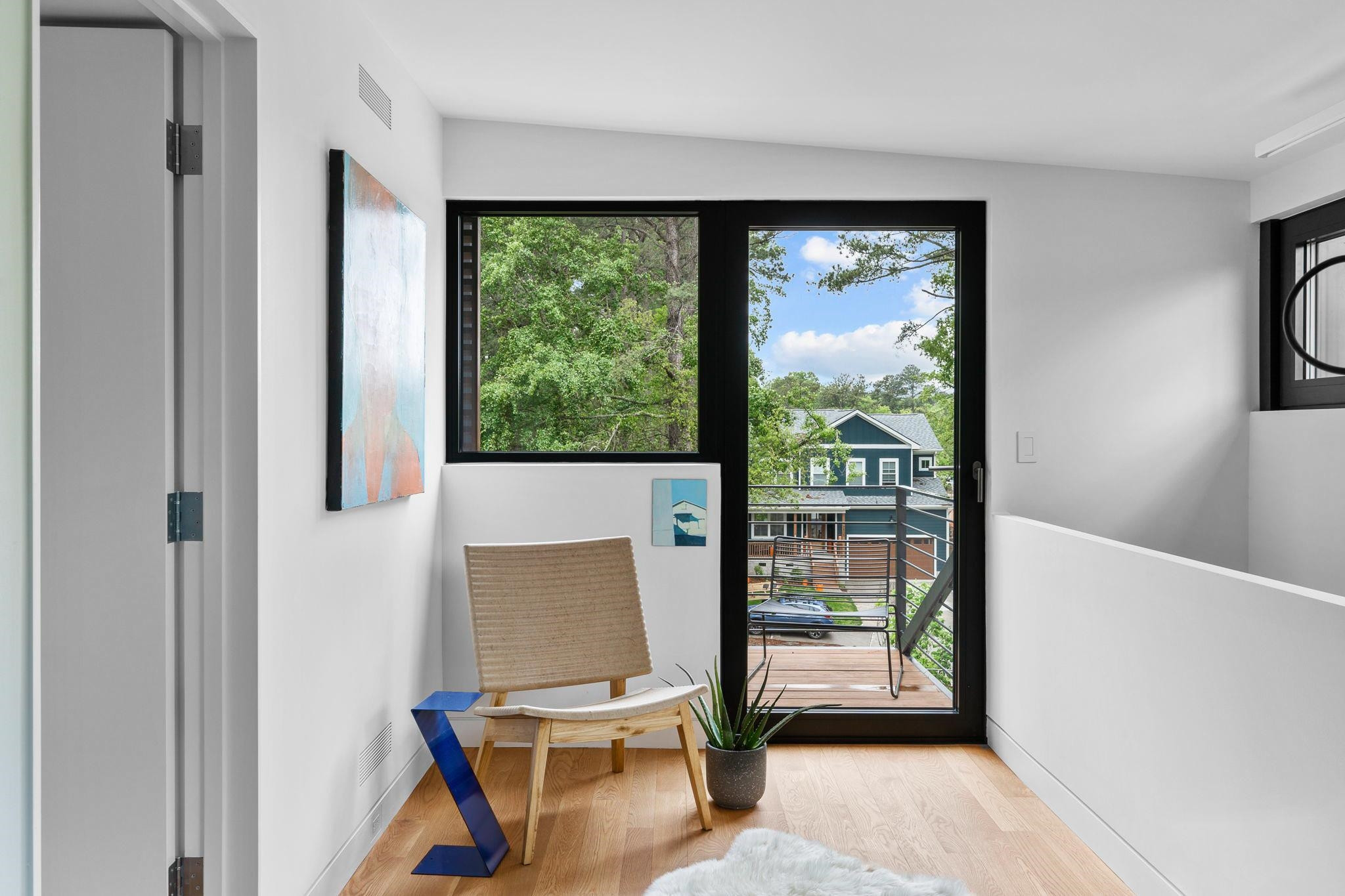 920 Tower Street Raleigh, NC 27607 - Photo 24 of 54 a view of a room with gym equipment and a large window