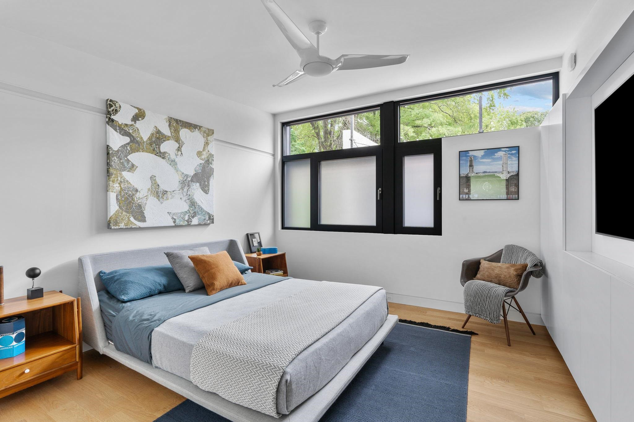 920 Tower Street Raleigh, NC 27607 - Photo 35 of 54 a bedroom with a large bed and a window