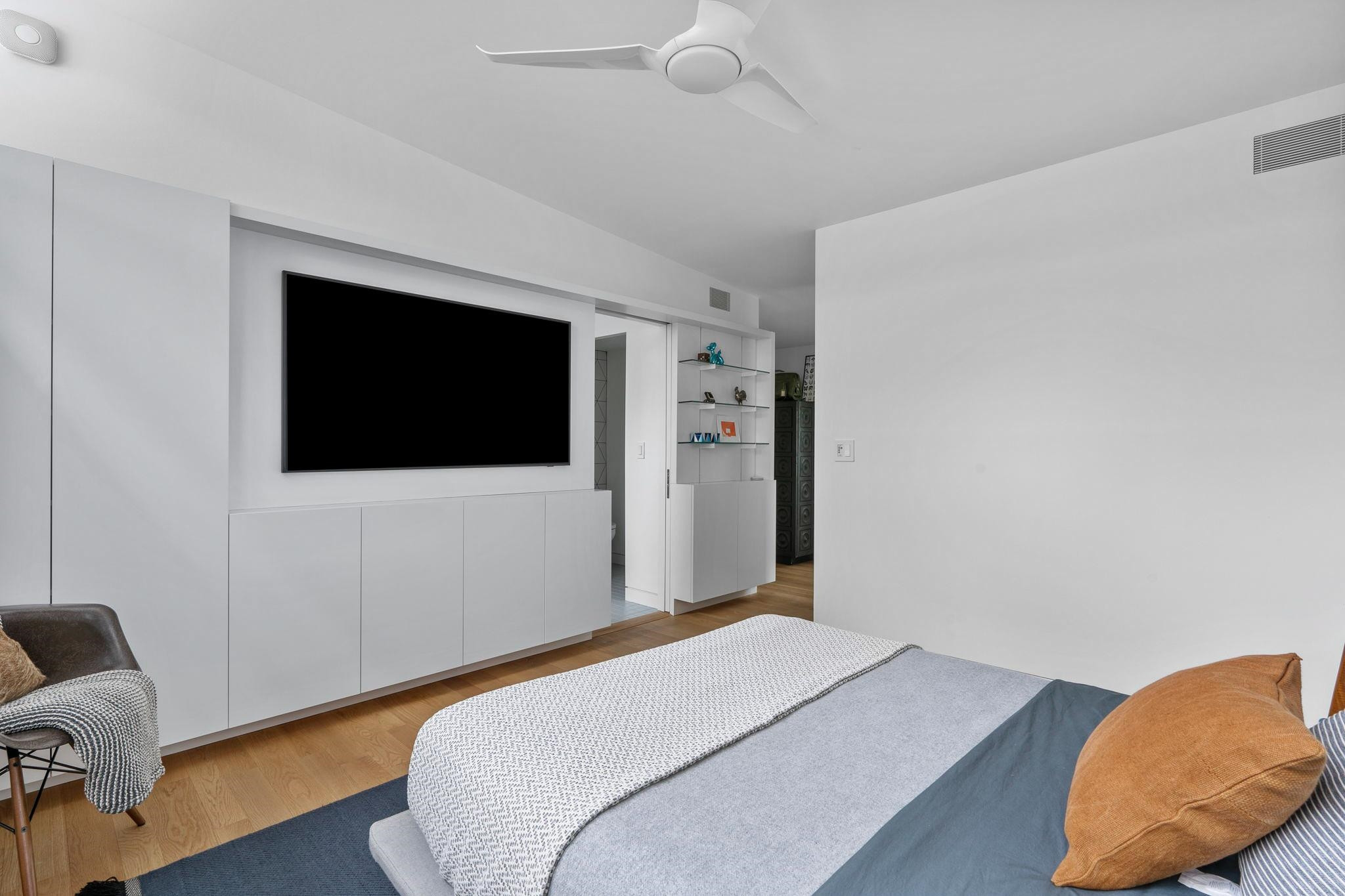 920 Tower Street Raleigh, NC 27607 - Photo 36 of 54 a bedroom with a bed and a television