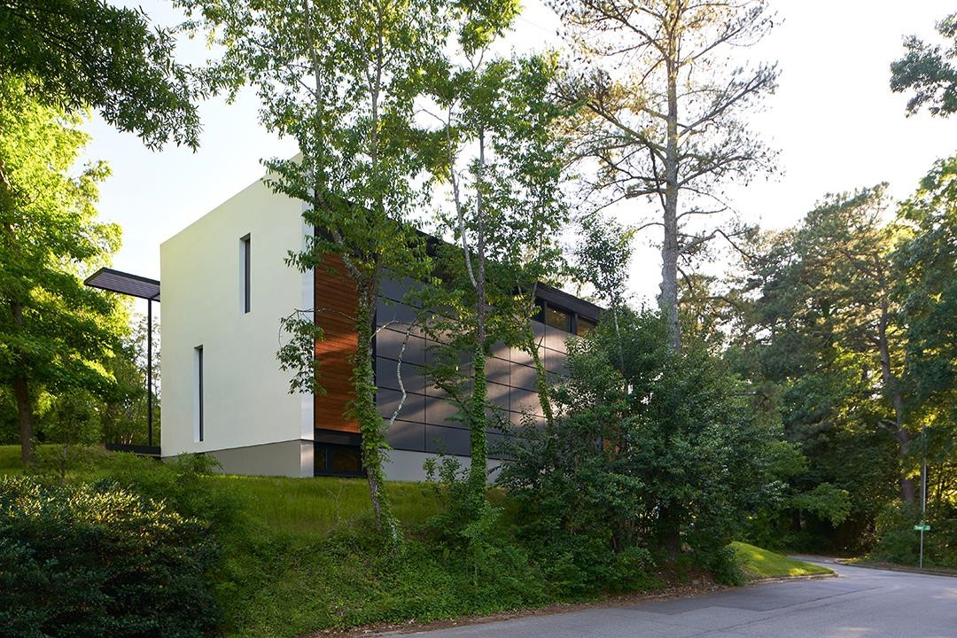 920 Tower Street Raleigh, NC 27607 - Photo 40 of 54 a front view of a house with a yard and tree s