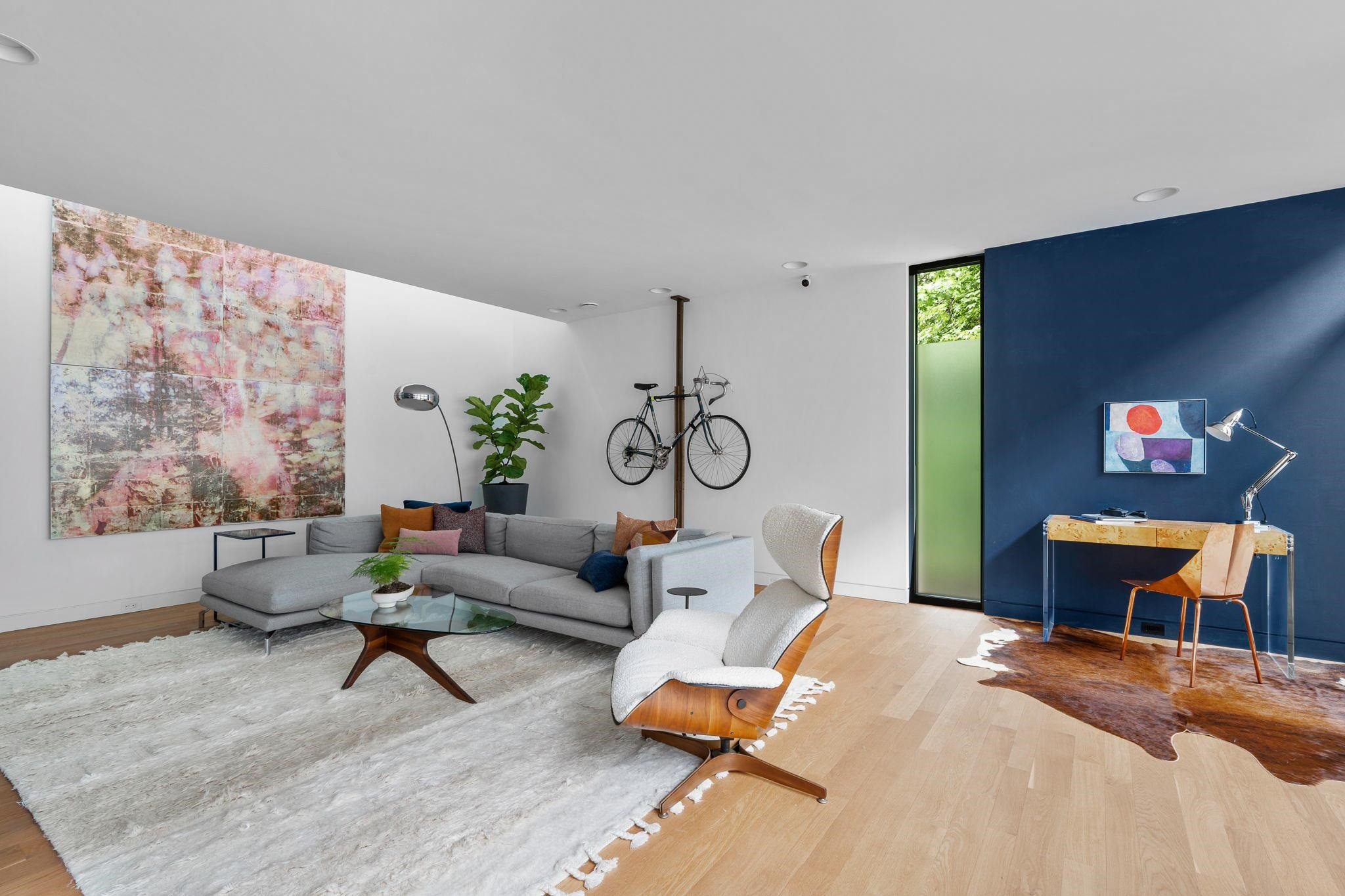 920 Tower Street Raleigh, NC 27607 - Photo 9 of 54 a living room with furniture and a large window