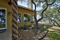 a view of a house with a tree