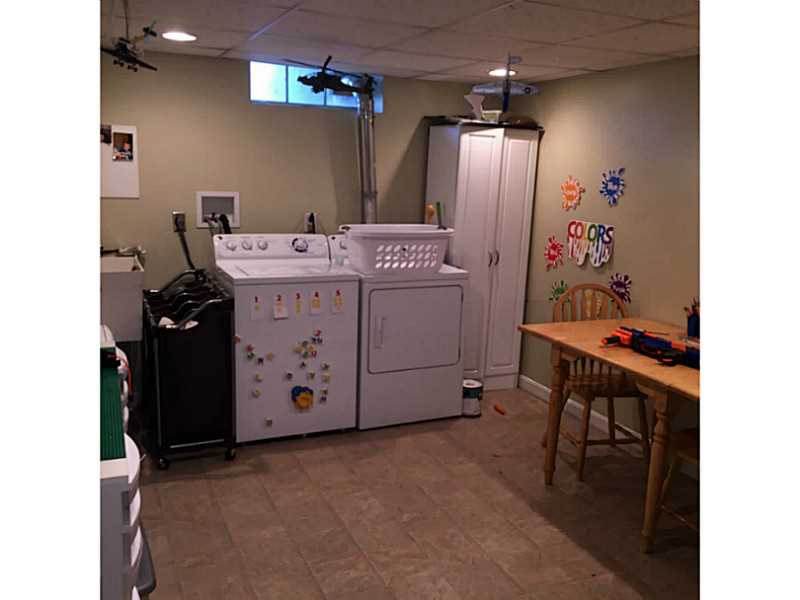 33 Scarborough Road Pawtucket, RI 02861 - Photo 17 of 18 Laundry Room. Laundry and play room
