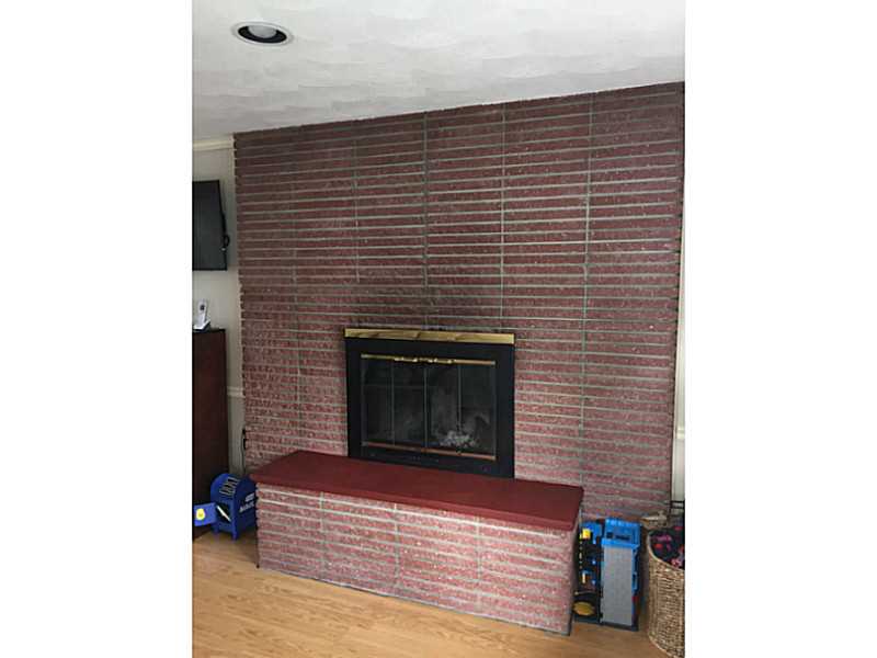 33 Scarborough Road Pawtucket, RI 02861 - Photo 10 of 18 Den/Family/Great Room. Fireplace in family room