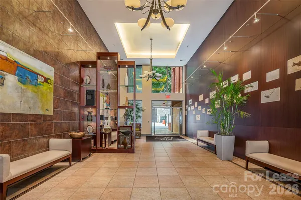 a view of outdoor space with swimming pool and sitting area