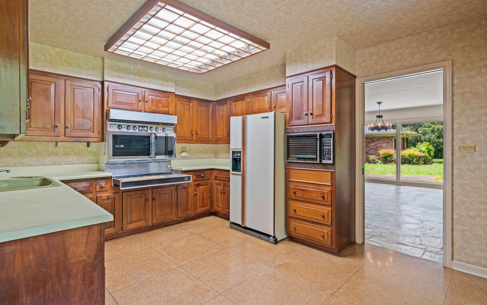 4295 Blue Ridge Drive Blue Ridge, GA 30513 - Photo 22 of 58 a kitchen with stainless steel appliances granite countertop a refrigerator and a stove top oven