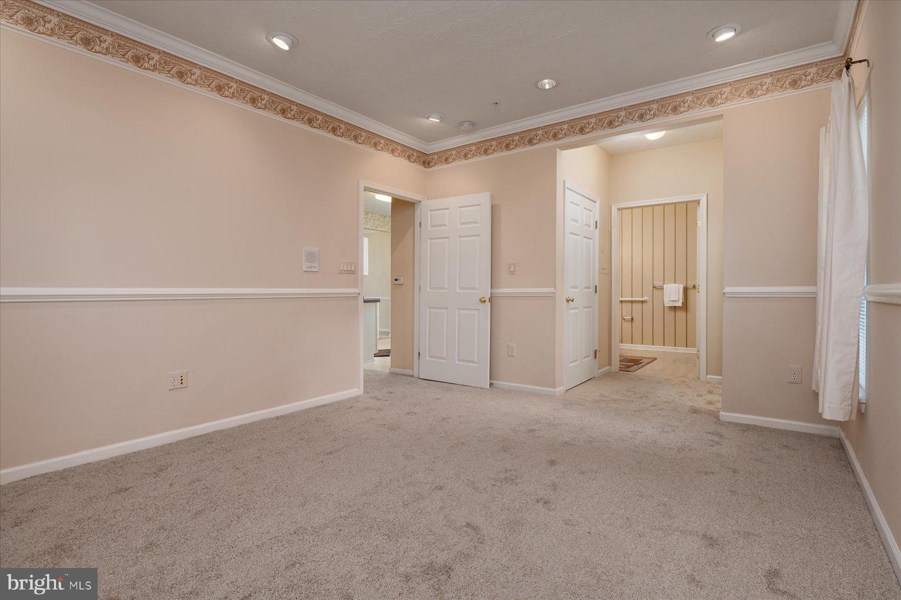 2502 Amber Orchard Court West, Unit 104 Odenton, MD 21113 - Photo 15 of 28 a view of an empty room