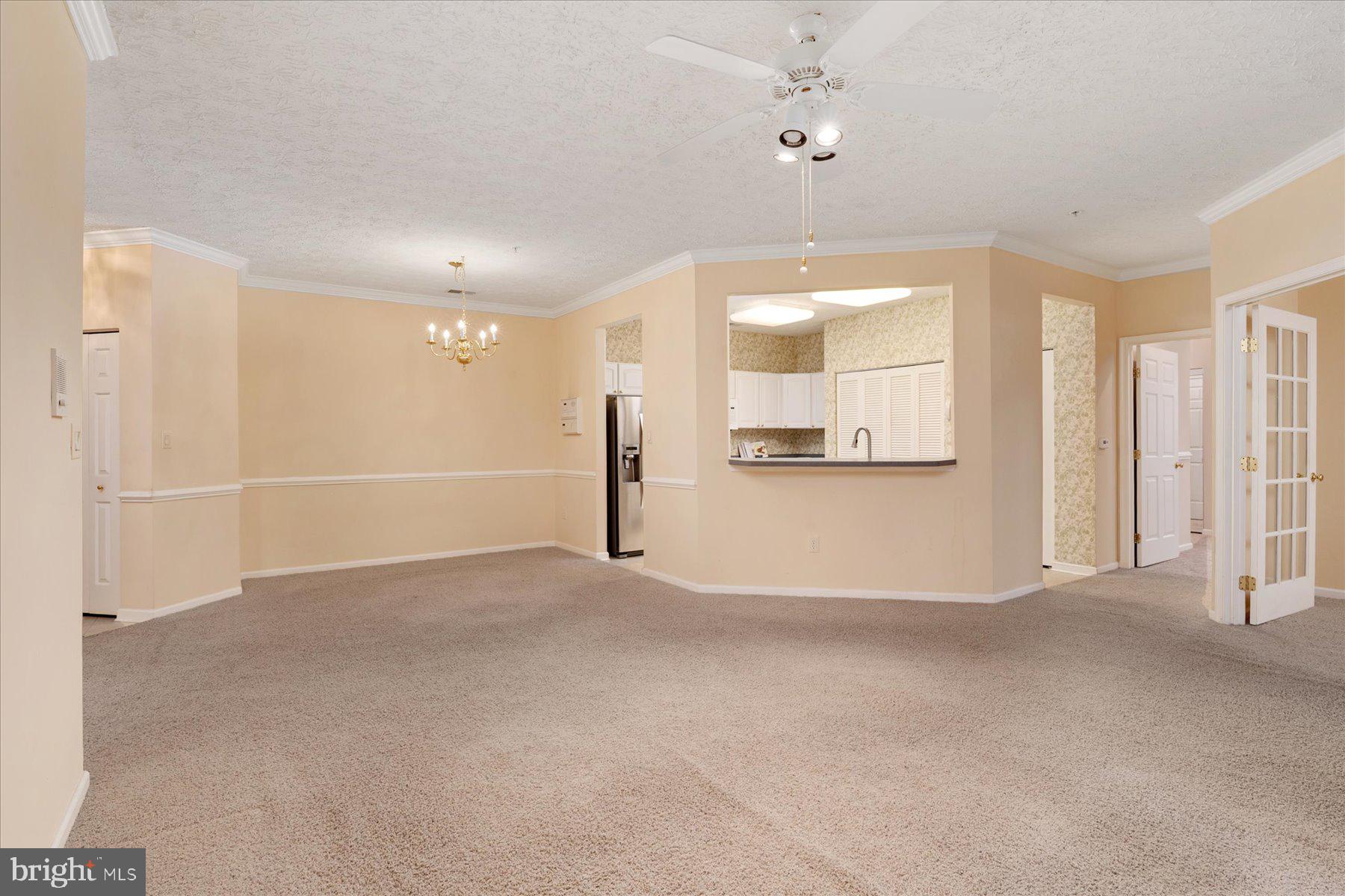 2502 Amber Orchard Court West, Unit 104 Odenton, MD 21113 - Photo 5 of 28 an empty room with a bathroom