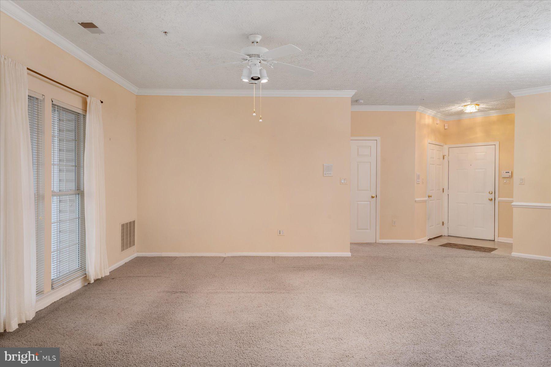 2502 Amber Orchard Court West, Unit 104 Odenton, MD 21113 - Photo 6 of 28 a view of an empty room