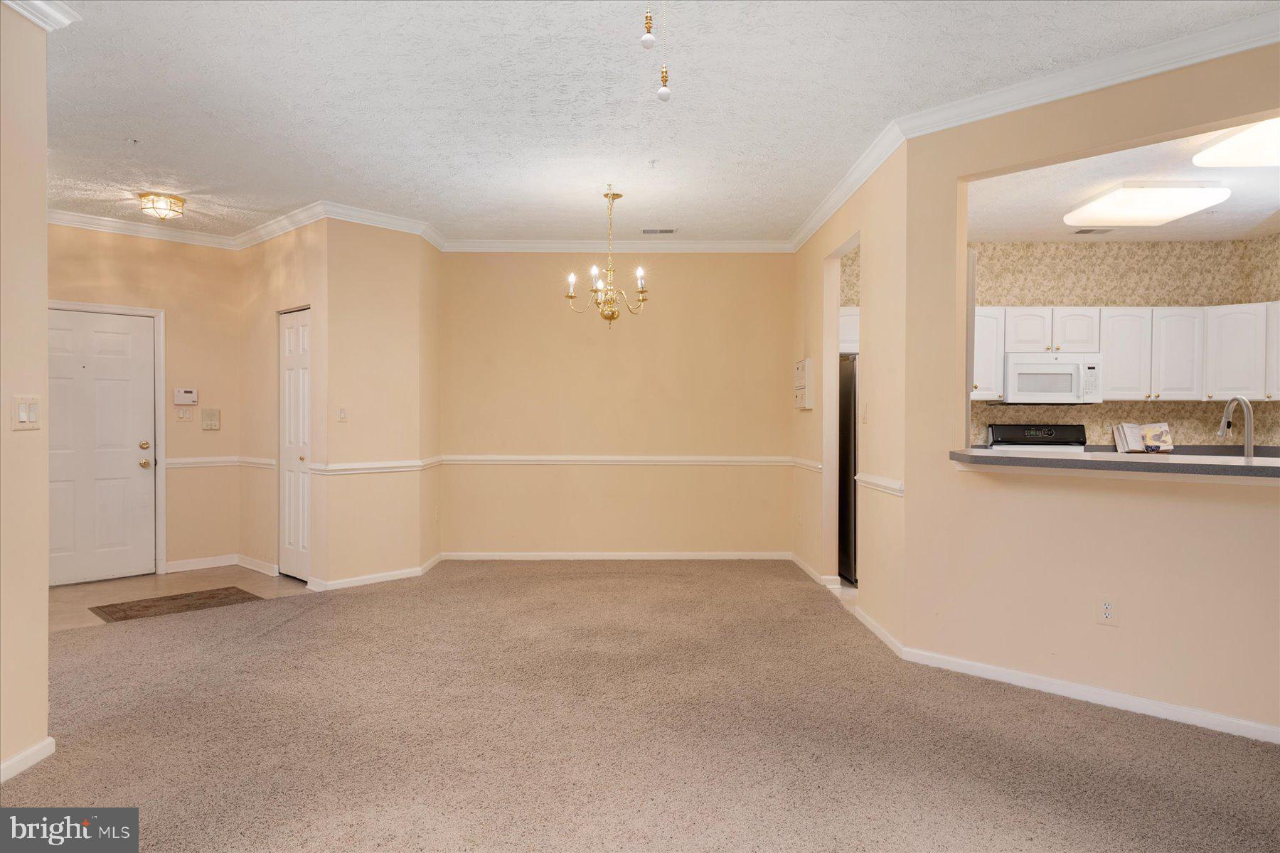 2502 Amber Orchard Court West, Unit 104 Odenton, MD 21113 - Photo 9 of 28 a view of a kitchen with a sink