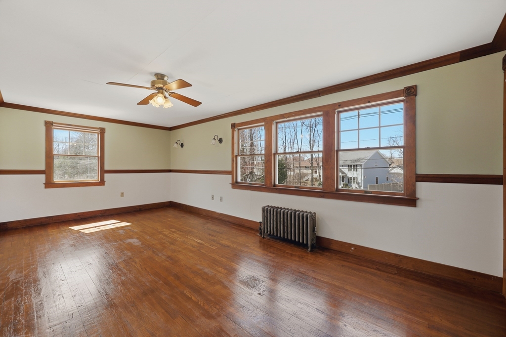 3 Ferry Road Salisbury, MA 01952 - Photo 16 of 35 a view of an empty room with a window and wooden floor