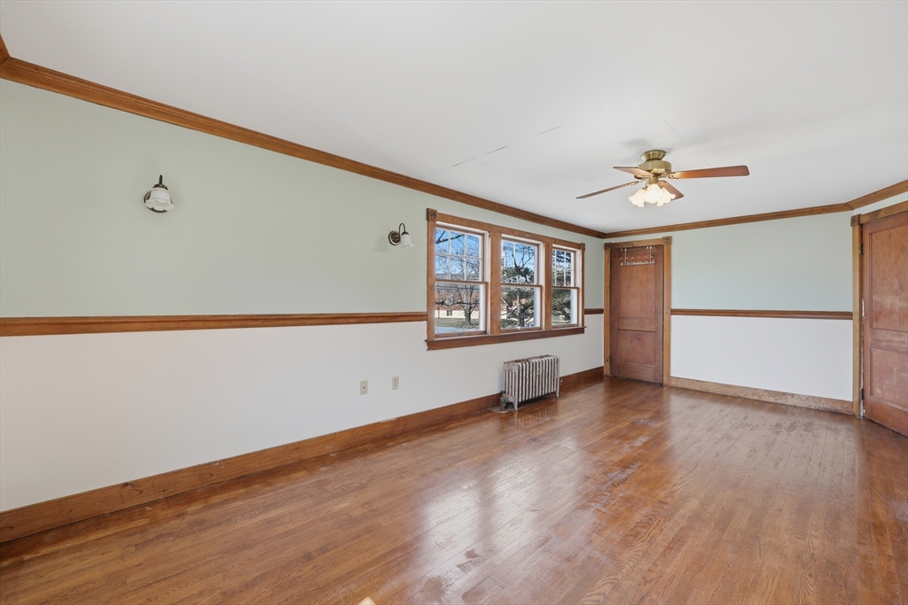 3 Ferry Road Salisbury, MA 01952 - Photo 17 of 35 an empty room with wooden floor and windows