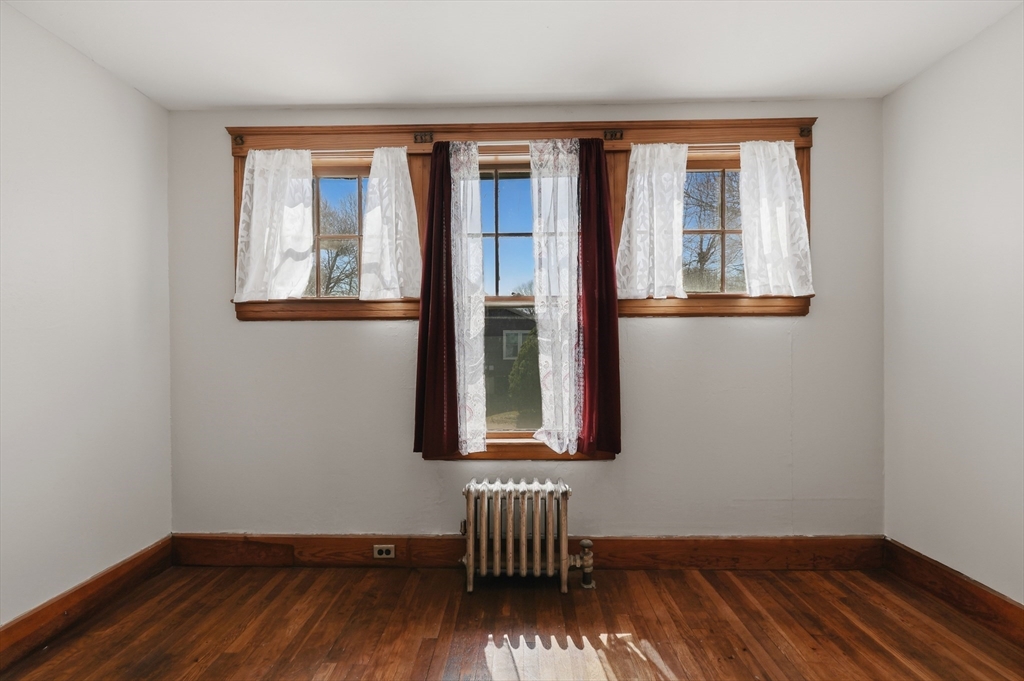 3 Ferry Road Salisbury, MA 01952 - Photo 25 of 35 an empty room with wooden floor and windows