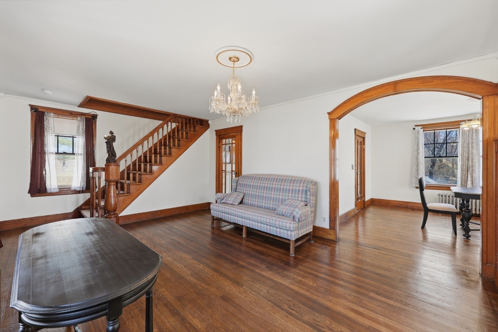 3 Ferry Road Salisbury, MA 01952 - Photo 4 of 35 a view of front door with dining room and wooden floor